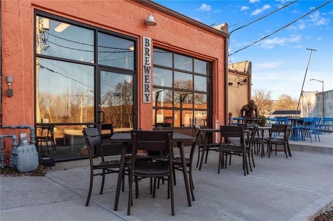View of patio featuring outdoor seating | Image 9