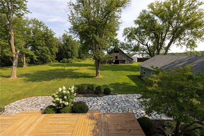 View of yard featuring a patio area | Image 54