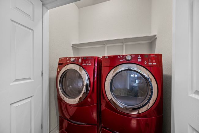 Washroom featuring washing machine and dryer | Image 27