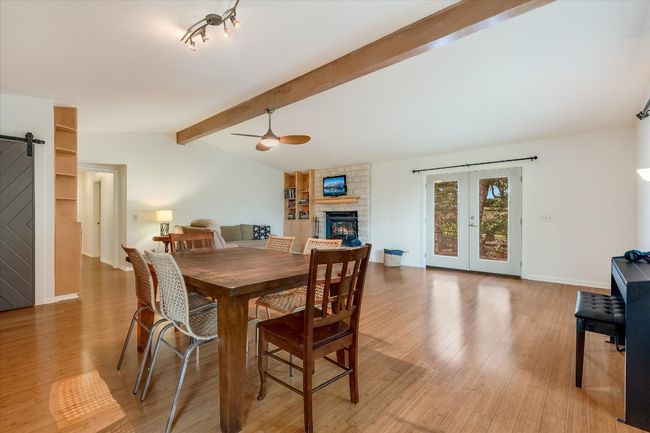 Dining area view of living room and fireplace | Image 7