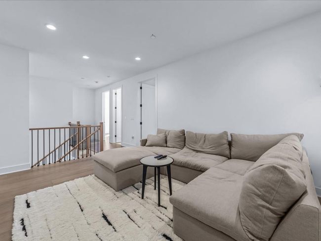 Living room with recessed lighting, baseboards, and wood finished floors | Image 11