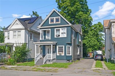 View of front of home with covered porch | Image 1