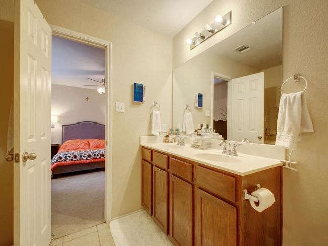 Staged earlier. Carpet replaced with Laminate flooring | Image 25