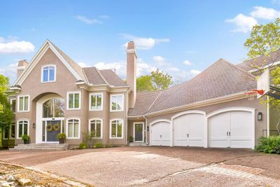 View of front of home with a garage | Image 2