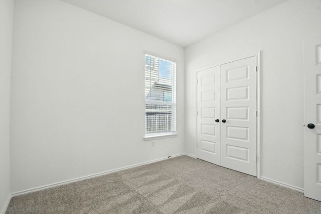 Unfurnished bedroom with carpet and a closet | Image 21