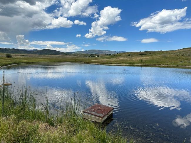 Property view of water with a mountain view | Image 12