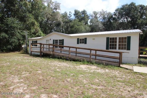 306 S Magnolia Ave, FLORAHOME, FL, 32140-3112 | Card Image