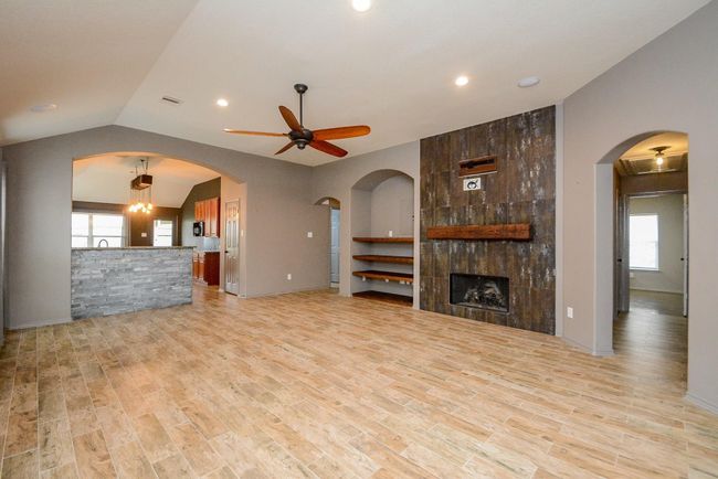 Beautiful tile flows from the living room and throughout the home. | Image 4