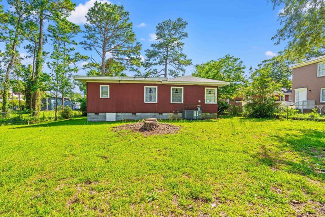 Back of property with crawl space | Image 25