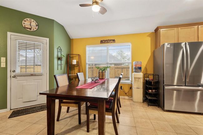 This thoughtfully designed homeseamlessly connects the kitchen witha charming breakfast area. | Image 13