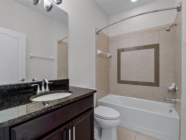 downstairs full bath doubles as the pool bath too! | Image 33