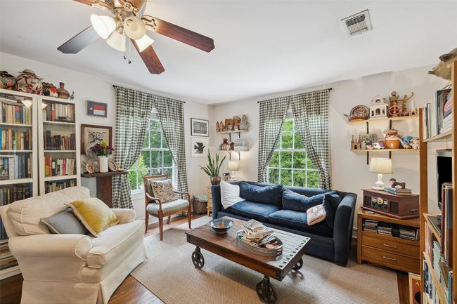 Main living area with original hardwood floors | Image 25