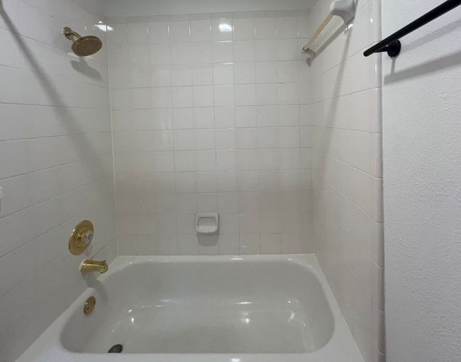 Full bathroom featuring shower / bathtub combination | Image 31
