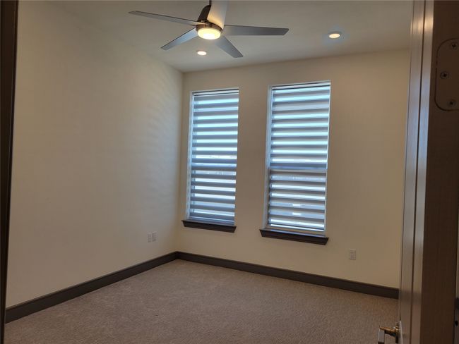 Carpeted spare room featuring recessed lighting, a ceiling fan, and baseboards | Image 18