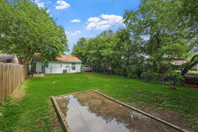 View of yard with central air condition unit and a fenced backyard | Image 16