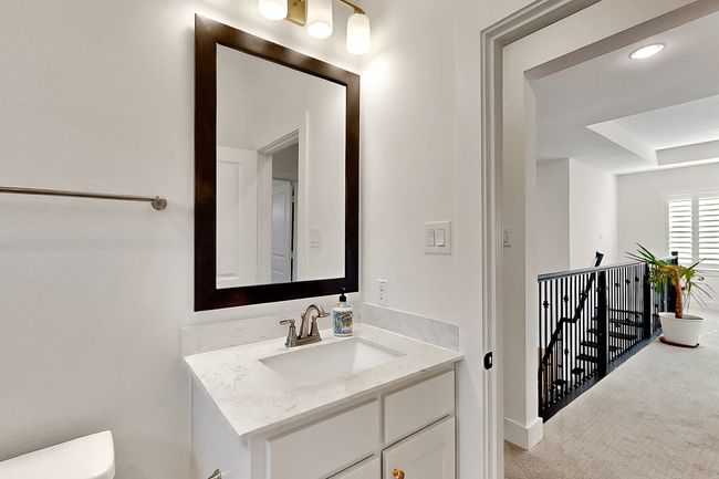 Half bath with toilet and vanity | Image 25