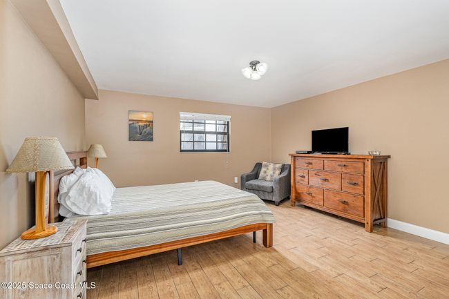 Upstairs East Bedroom with Peekaboo view of Ocean and Spacious closet | Image 24