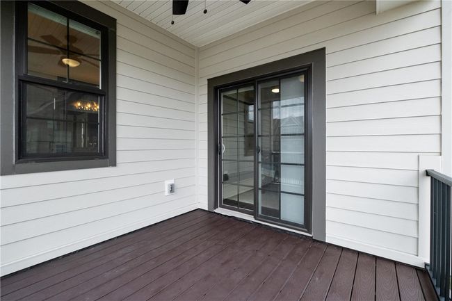 Owner's Suite private covered deck with low maintenance flooring and railing. | Image 23