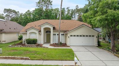 6427 Weatherwood Circle, House other with 4 bedrooms, 2 bathrooms and null parking in Wesley Chapel FL | Image 1