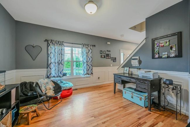 Large Formal Dining Room Or Den With Wainscoting | Image 13