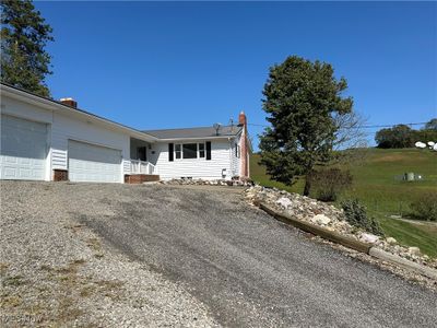 Single story home featuring a garage | Image 3