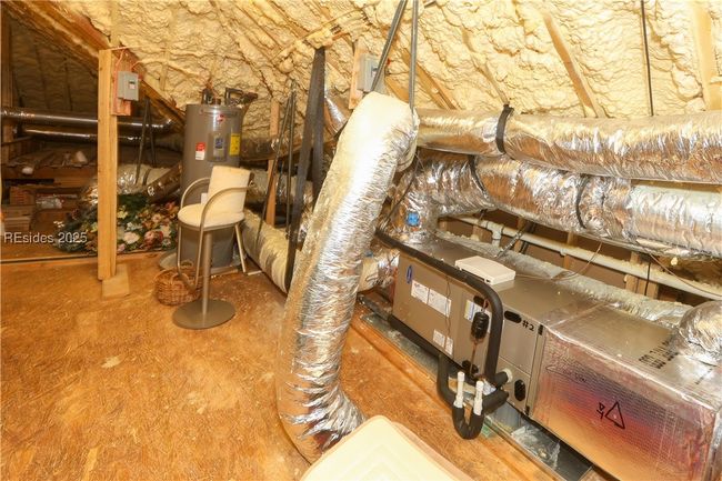 You may have never expected all of the storage area this attic provides with spray-foam insulation which makes it practically the same temperature as the home. | Image 41