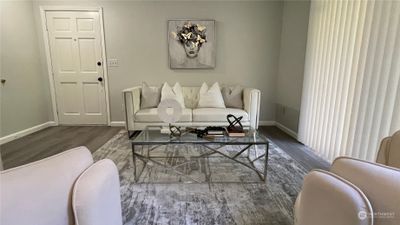 Living room with sliding door to patio | Image 3