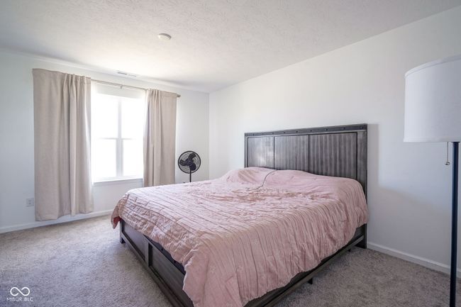 bedroom featuring carpet and baseboards | Image 20