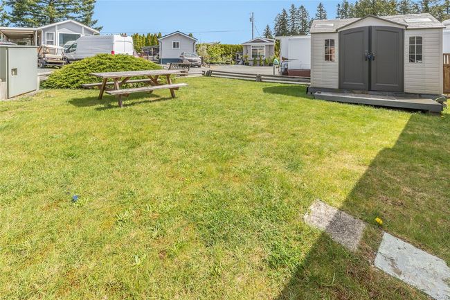 Sunny lot with storage shed | Image 7