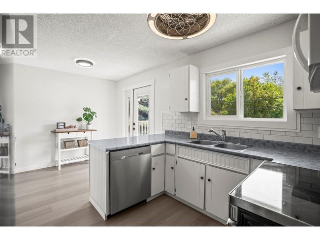 7708 Coldstream Creek Rd, House other with 4 bedrooms, 3 bathrooms and 2 parking in Coldstream BC | Image 6