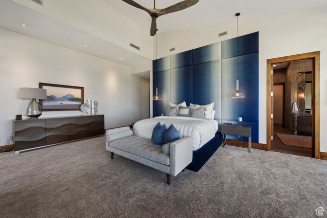 Carpeted bedroom with ceiling fan and baseboards | Image 29