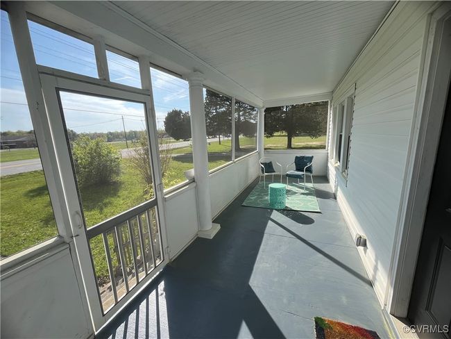 Sunroom / solarium featuring a healthy amount of sunlight | Image 6