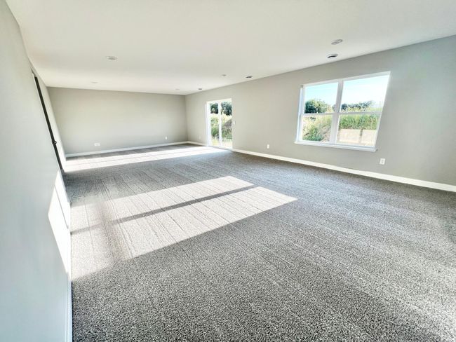 Actual home: Light pours into the lower level thanks to the walkout and large windows! | Image 38