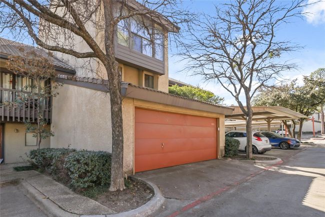 View of side of property featuring stucco siding and a tiled roof | Image 4