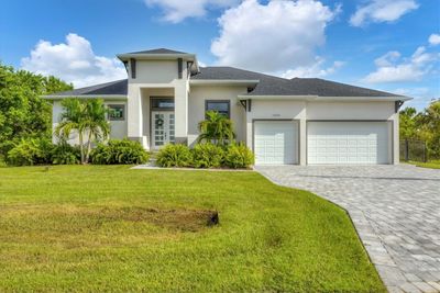 10169 Cocoa Beach Street, House other with 3 bedrooms, 2 bathrooms and null parking in Port Charlotte FL | Image 1