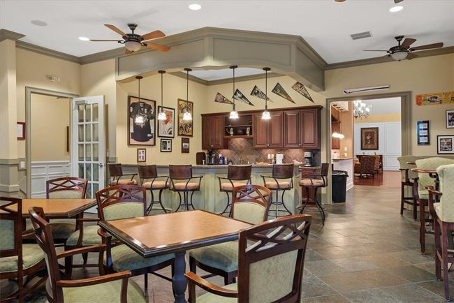 Meet up with some friends and enjoy some time in the bar area of the community center. | Image 43