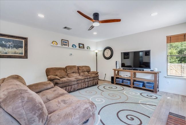 2nd Living room (Den) is located adjacent to the kitchen & breakfast area, and features newly installed can lighting! | Image 15