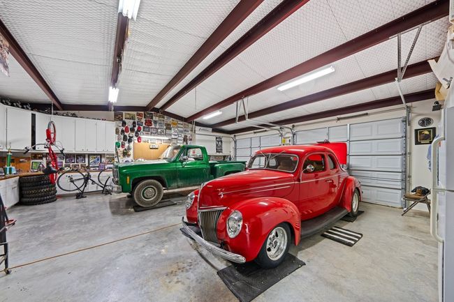 Interior 2 car garage attached to the Guest House | Image 10