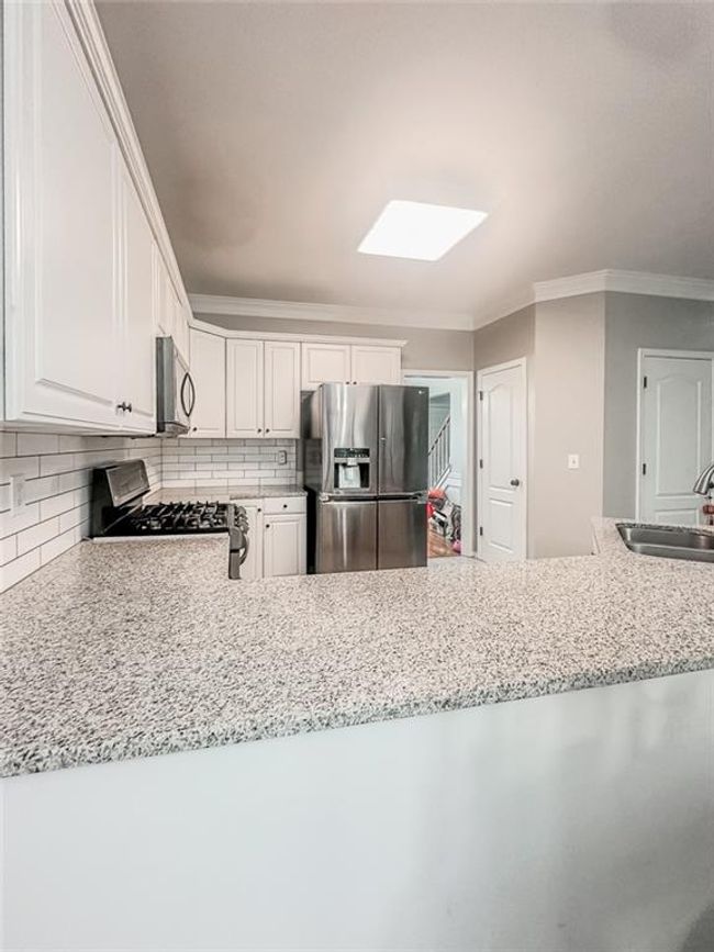 1485 Oglethorpe Run Ln, House other with 4 bedrooms, 3 bathrooms and 2 parking in Suwanee GA | Image 5