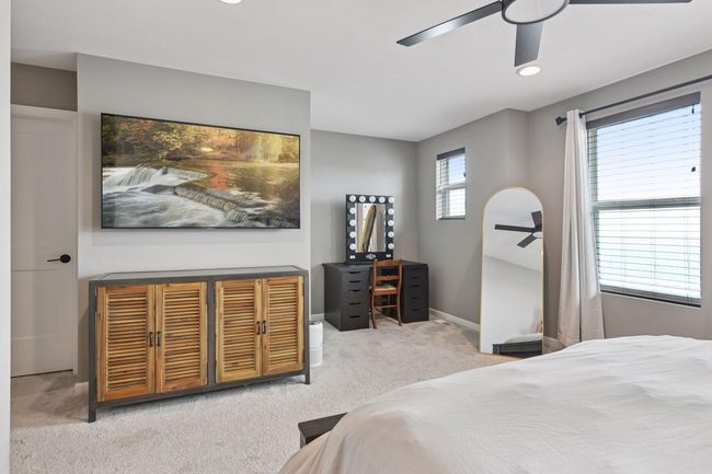 The suite features a private sitting area and a large walk-in closet. | Image 9