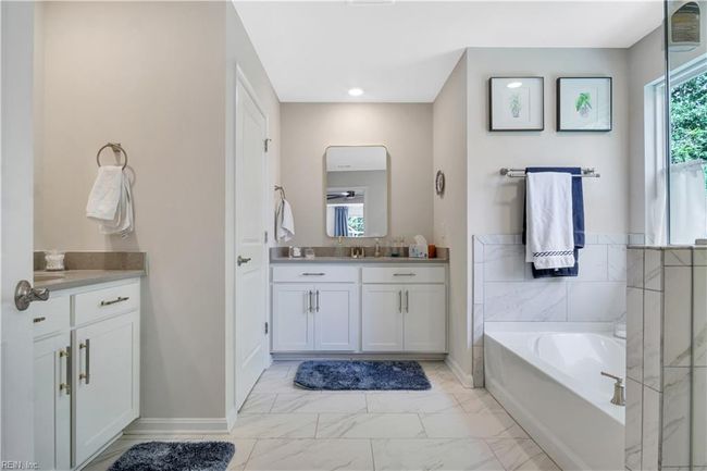 Main bath, with two separate vanities. | Image 22