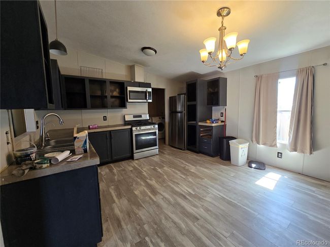6500 88 Th Ave, Home with 3 bedrooms, 2 bathrooms and 2 parking in Henderson CO | Image 8