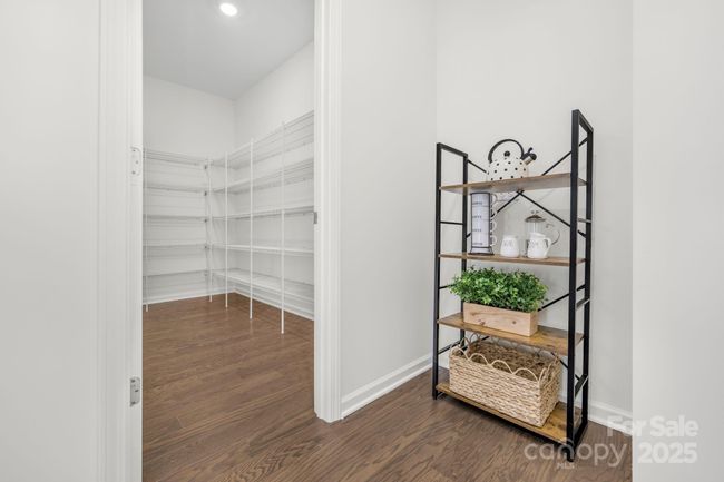 Back hall and pantry as you come in from the garage | Image 13