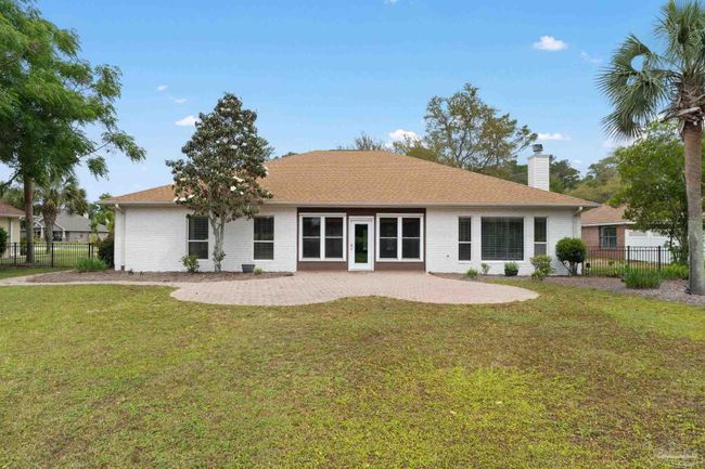 7008 Turnberry Cir, House other with 4 bedrooms, 2 bathrooms and 3 parking in Navarre FL | Image 38