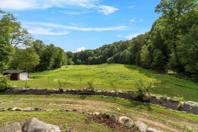 Stone walls driveway leading to back patio. See special feature sheet for outbuildings: garage, tool shed, chicken coop, wood storage shed & Amish made rough Sawn Outhouse! | Image 46