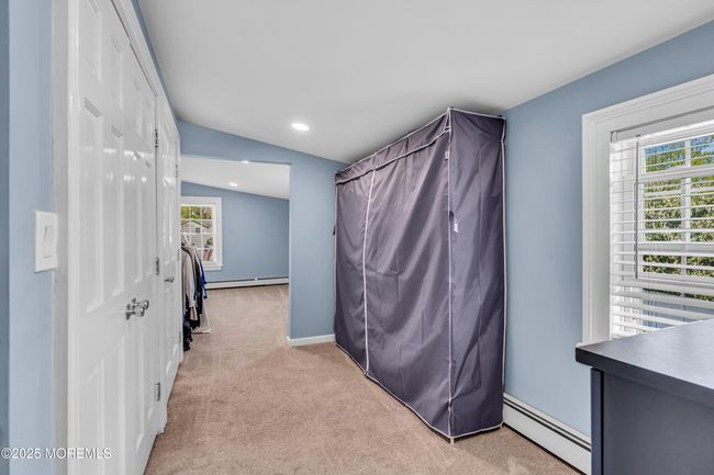 adjacent dressing room with double closets | Image 25