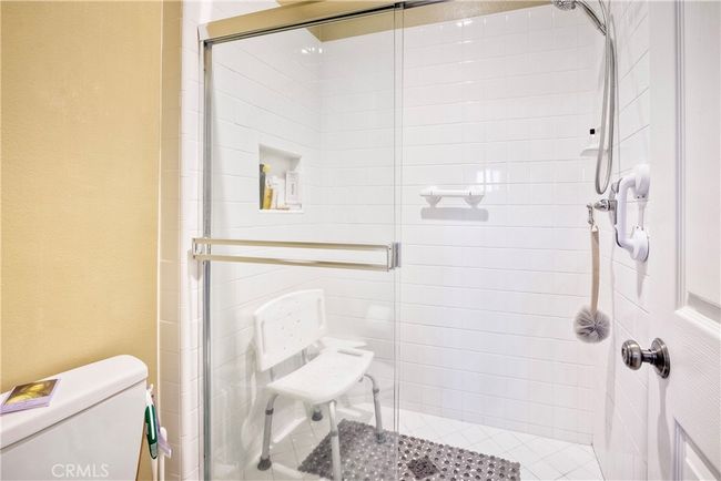 Ensuite primary bath also offers convenient step-in shower! | Image 31