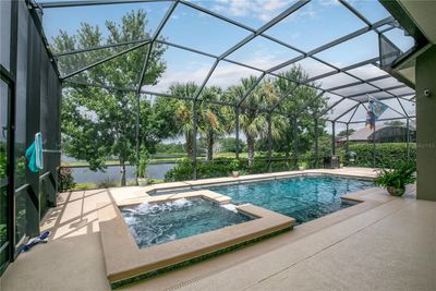 8065 Bridgeport Bay Circle, House other with 4 bedrooms, 2 bathrooms and null parking in MOUNT DORA FL | Image 2