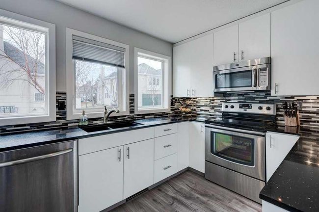 34 Candle Terrace Sw, Home with 2 bedrooms, 1 bathrooms and 4 parking in Calgary AB | Image 5