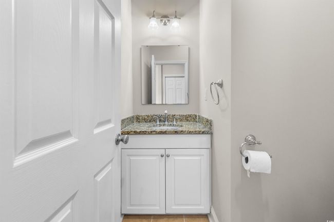 Bathroom featuring vanity and baseboards | Image 9